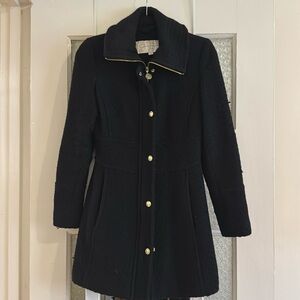Black coat with gold zipper and buttons